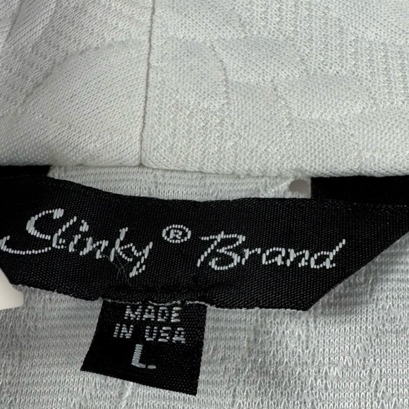 Slinky Brand White Quilted Vest with black trim size large decent condition - Picture 2 of 6